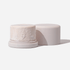 Sulfate-free solid shampoo bar with holder, part of organic cosmetics and eco-friendly hair care bundle.