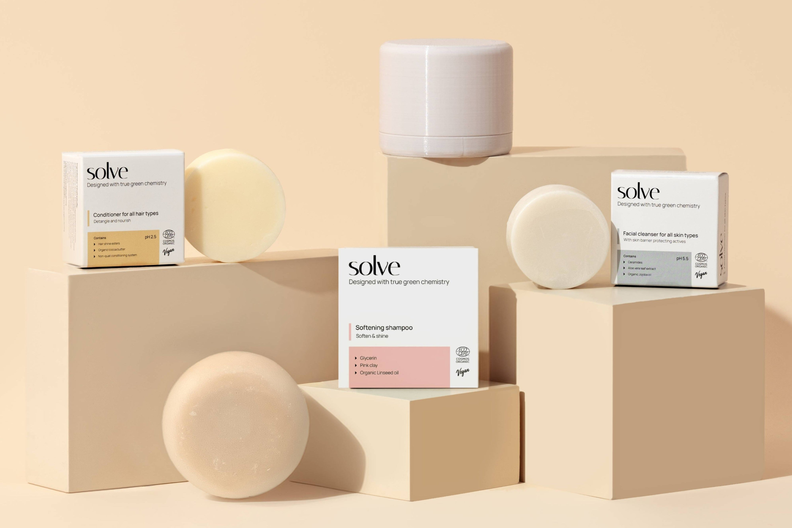 Solve haircare products on beige blocks with a beige background